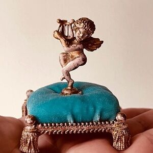 Vintage Florentine cherub pin holder